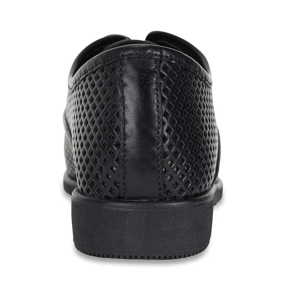 Raquel Brogue in Black Leather