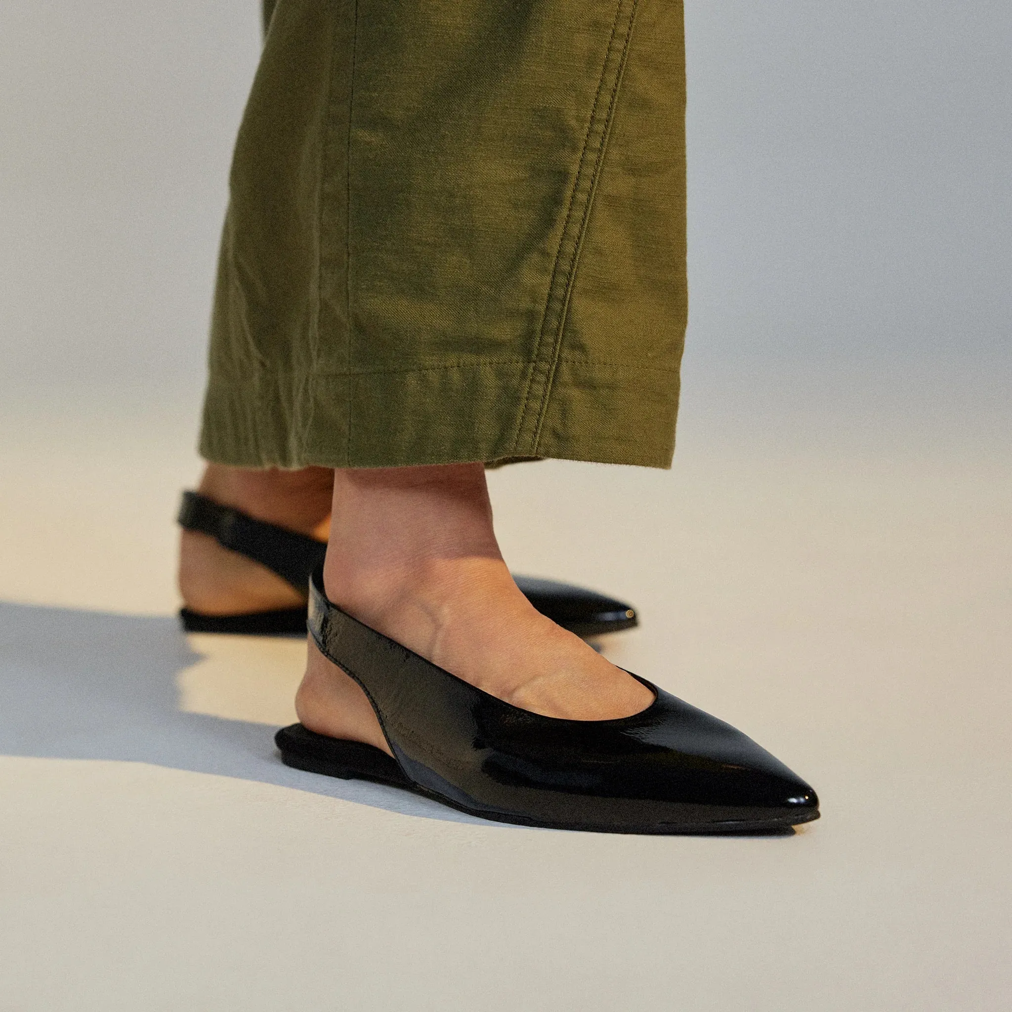 Rollie Pointed Slingback Black Patent
